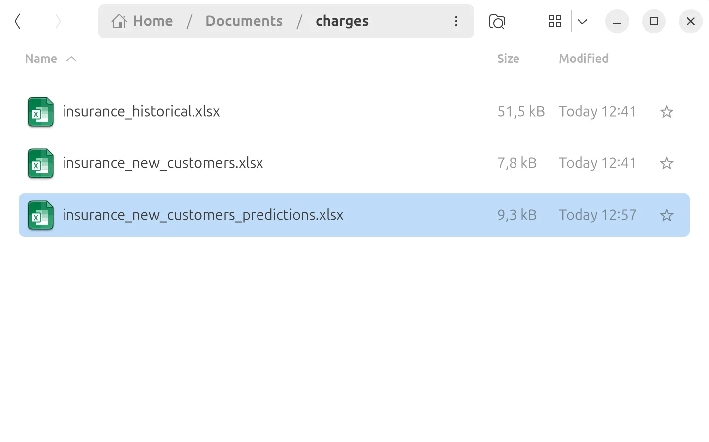 The new predictions workbook beside the two input files